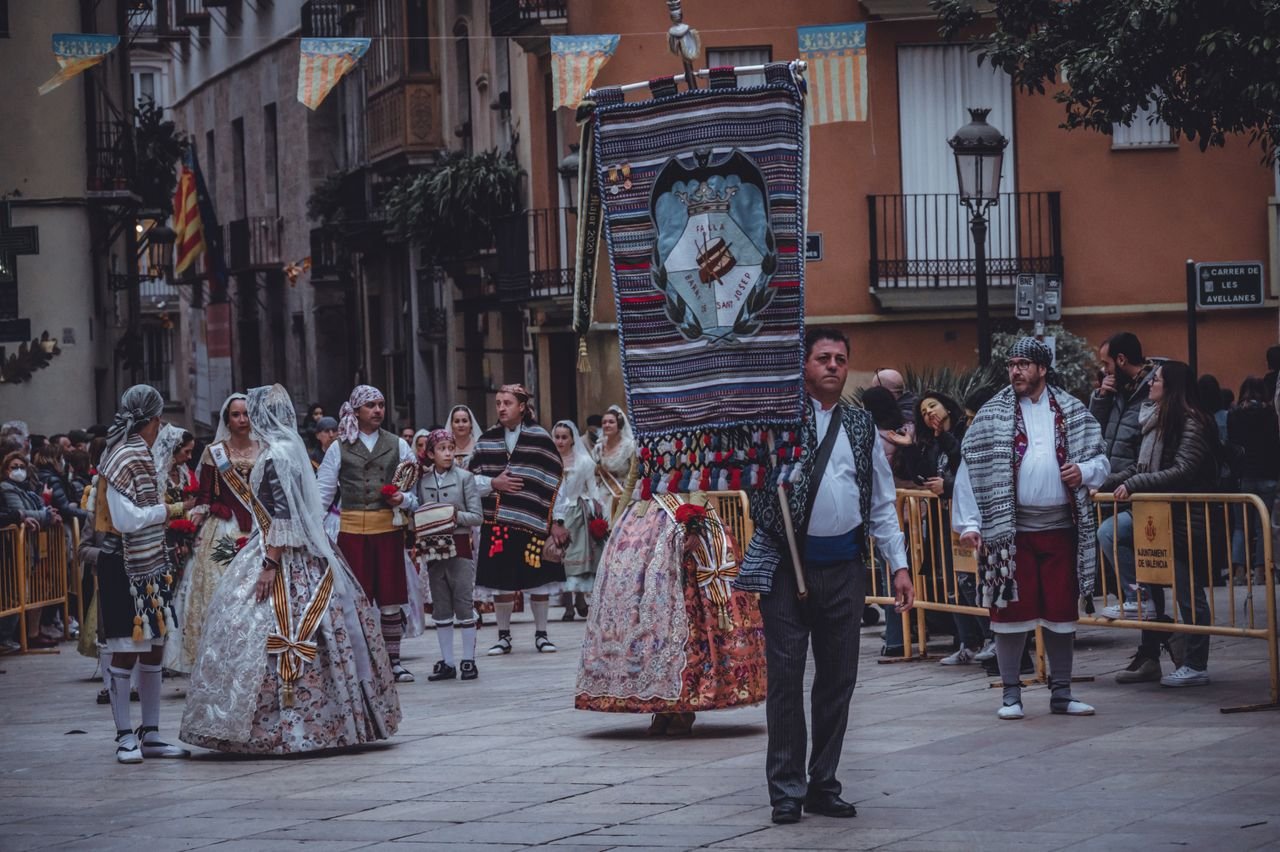 Home Traditional clothing parade in Valencia, Spain, showcasing vibrant costumes and cultural heritage.