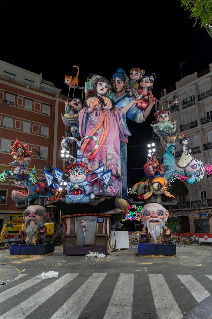 Home Colorful illuminated ninot display during Fallas Festival in Valencia, Spain, showcasing traditional artistry and celebration.